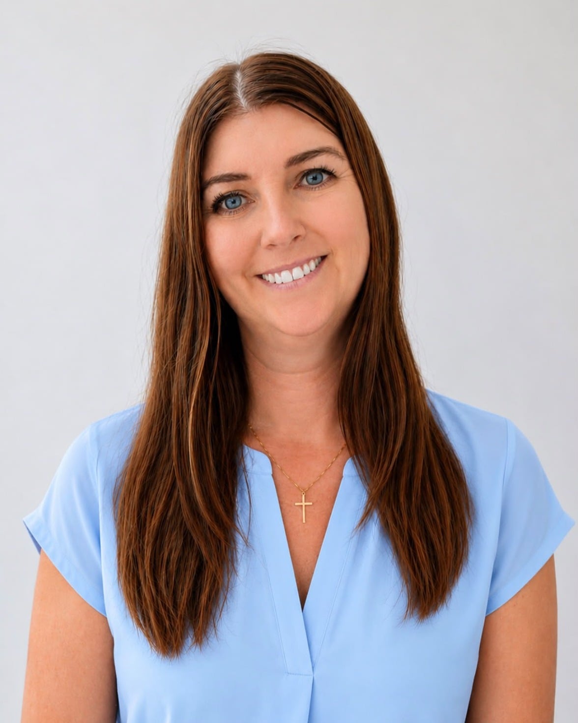 Shelley Alcock, head and shoulders, against a plain pale background.